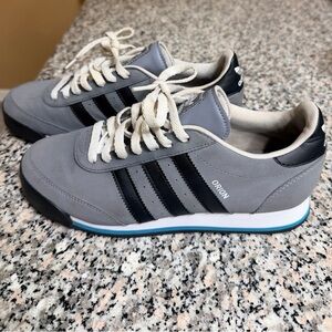 adidas Orion Gray Sneakers with Black Stripes and Blue Trim